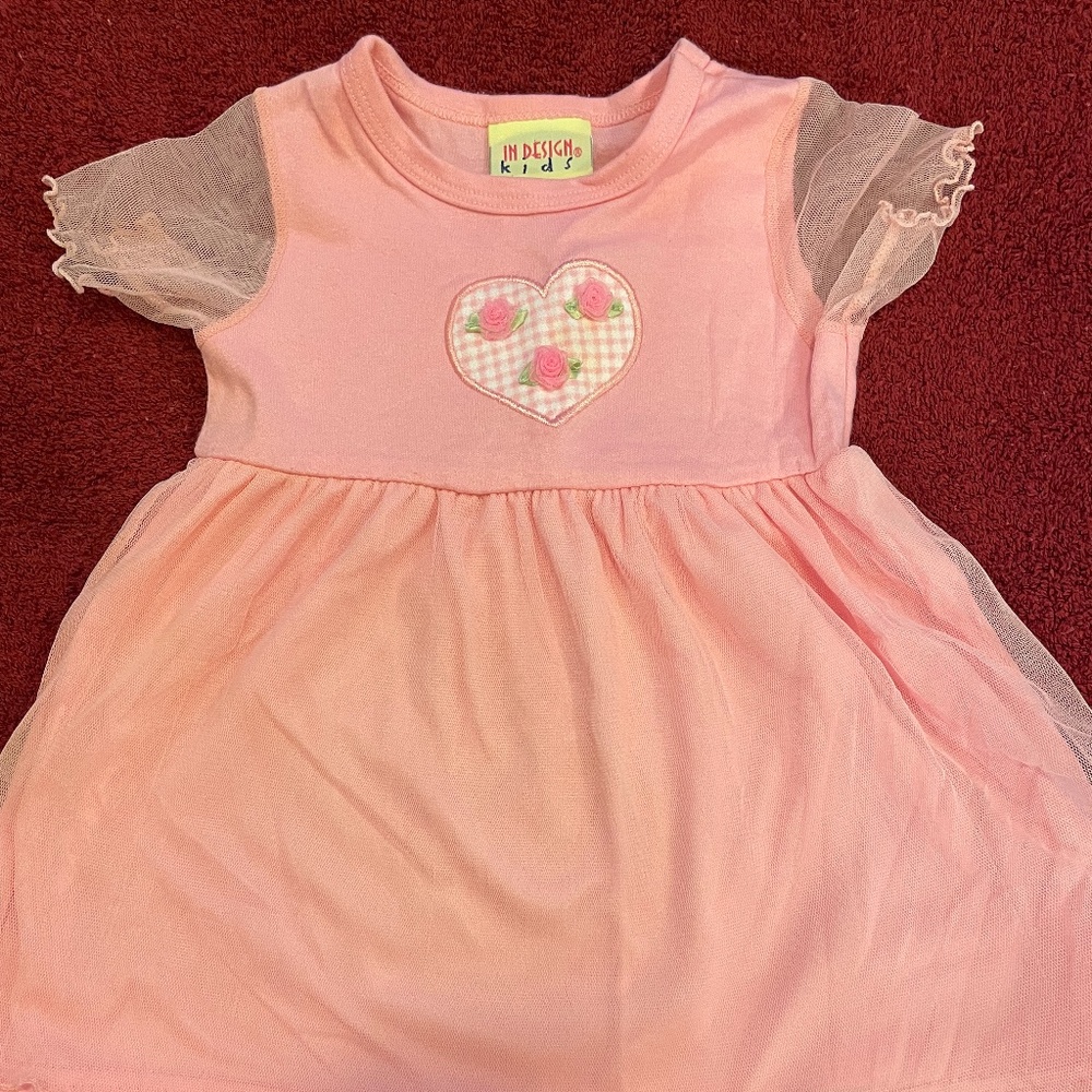 IN DESIGN Kids pink dress. Cute heart w/pink roses in middle. Size 18 months.